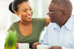 yolo-300x200-2 Nurse having a cup of coffee with a home health patient